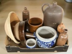 A group of stoneware bottles, West German glazed planters, kitchen bowls, etc.