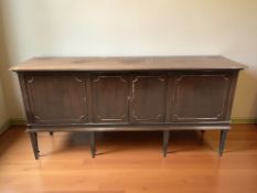 A continental mahogany four door sideboard, 181 cm x 50 cm x 85 cm.