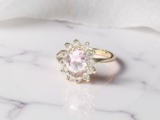 A 9ct gold kunzite and colourless paste cluster ring, size N CONDITION REPORT: 2.