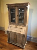 A 19th century pine fall front bureau bookcase, 102 cm x 52 cm x 204 cm.