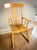 A contemporary beech rocking chair.