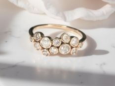 A 9ct rose gold diamond ring, size L CONDITION REPORT: 1.