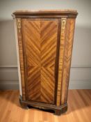 A continental kingwood veneered and gilt metal mounted corner cabinet, height 135 cm.