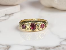 An antique 18ct gold ruby and diamond ring,