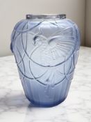 A French Sabino glass vase, with relief decoration depicting parakeets, height 20 cm.