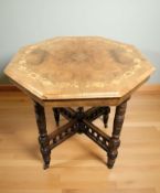 A late Victorian figured walnut satinwood octagonal occasional table, diameter 72 cm.