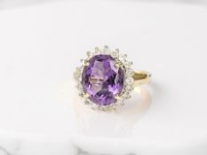 A 9ct gold amethyst and diamond ring,