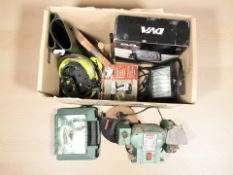 A group of power tools and hardware, Bosch sander in box, disk grinder, hard hat, etc.