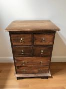 An Eastern hardwood six drawer chest,