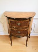 A continental kingwood veneered demilune chest, 64 cm x 37 cm x 73 cm.