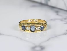 An antique 18ct gold sapphire and diamond ring, size O CONDITION REPORT: 2.