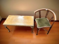 A late Victorian corner armchair and a coffee table