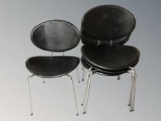 A set of four Scandinavian chrome and black vinyl chairs