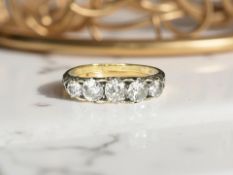 An 18ct gold five stone diamond ring, approximately 0.