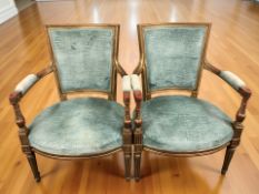 A pair of gilt wood salon armchairs, width 60 cm.