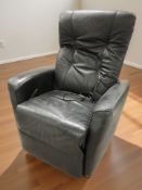 A black leather electric reclining chair.