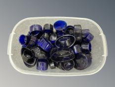 A group of antique blue glass condiment liners