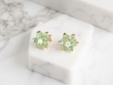 A pair of emerald and diamond floral cluster earrings CONDITION REPORT: 1.