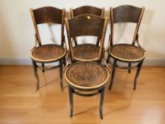 A set of four early 20th century bentwood chairs.