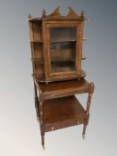A reproduction two tier mahogany lamp table, width 45 cm, and a glazed wall cabinet.