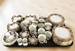 Approximately one hundred pieces of Royal Albert Crown china, tea and dinner wares.