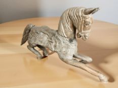 A Chinese wooden carving of a horse, length 69 cm.