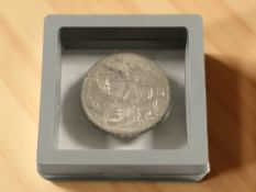 A George V 1935 rocking horse crown.