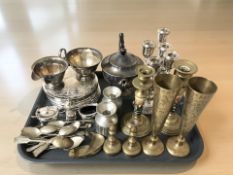 An EPNS three piece tea service, pair of candelabra, coasters, cruet set, brass candlesticks, etc.