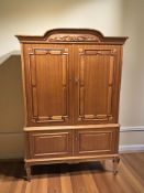 A reproduction double door cabinet, 115 cm x 50 cm x 172 cm.