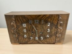 An Art Deco mantel clock, width 42 cm.