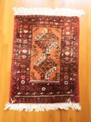 Four various Afghan / Pakistani Bokhara mats, each approximately 76 cm x 51 cm.