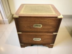 A brass mounted campaign style two-drawer chest, with tooled leather top,