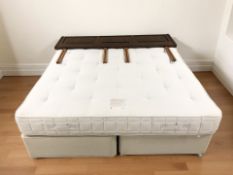 A 6 ft divan with John Lewis mattress and wooden headboard.