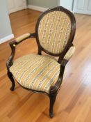 A continental carved beech salon armchair, width 59 cm.