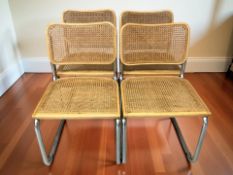 A set of four chrome cantilever chairs