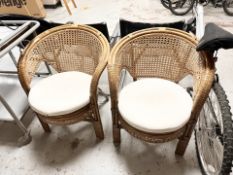 A pair of bentwood and wicker conservatory chairs