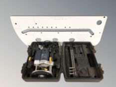 A Pro 2050W router, in box, and a joinery jig.