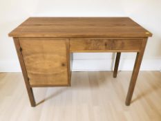 A 20th century Danish walnut and walnut veneer single pedestal desk, 104 cm x 51 cm x 78 cm.