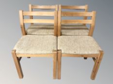 A set of four Danish pine chairs