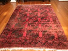 A Turkoman carpet, Afghanistan, 325 cm x 240 cm.