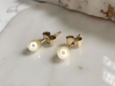 A pair of cultured pearl ear studs,