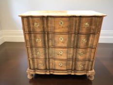 A 19th century continental pine serpentine front four drawer chest, 118 cm x 56 cm x 115 cm.