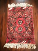 A Turkoman mat, Afghanistan, 80 cm x 50 cm.