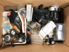A quantity of fishing equipment, various reels, spools of line, etc.