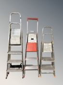 Five various aluminium step ladders