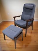 A Scandinavian stained wood lounge armchair and footstool.