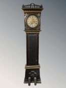 An early 20th century continental and painted gilt long case clock, with pendulum and weights,