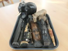 A group of African carvings, ebony elephant knife in sheath.