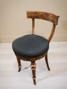 A continental walnut occasional chair