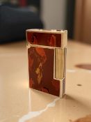 A Dupont gold-plated and 'Laque de Chine' gas lighter, numbered 83GEP60, height 6cm.